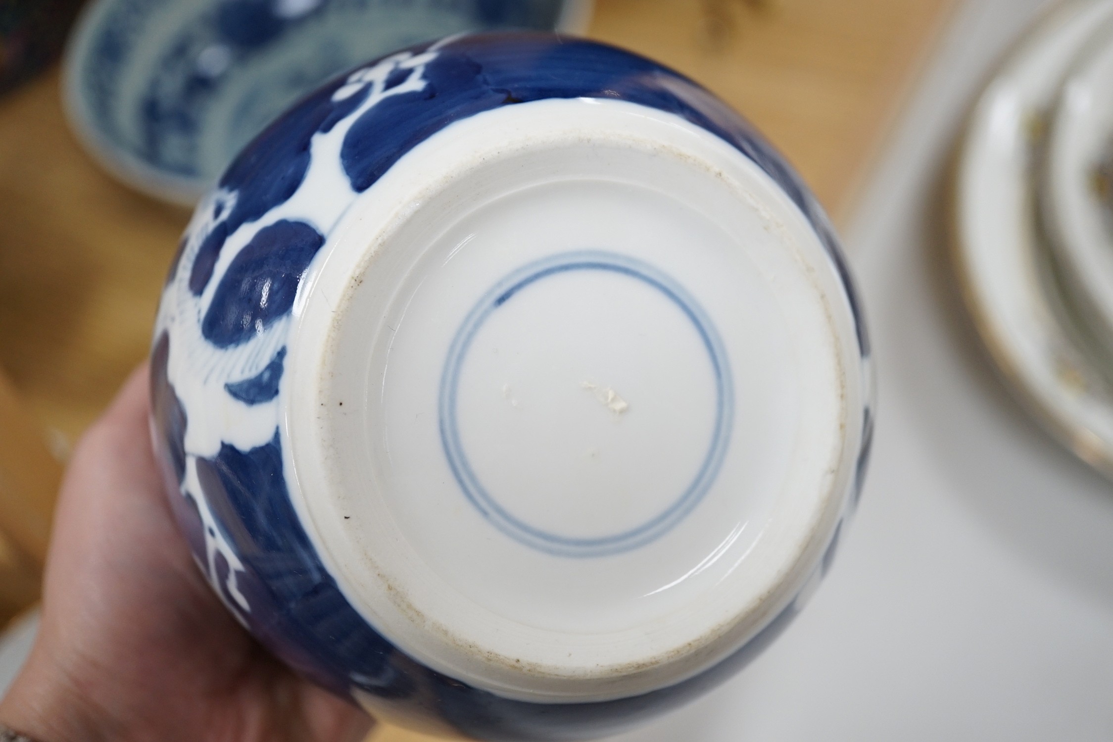 A group of various Chinese ceramics, to include a blue and white prunus jar, an earthenware dish, a famille rose jar and cover and others